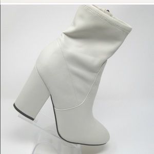 Marc Fisher boots w pen marks on them